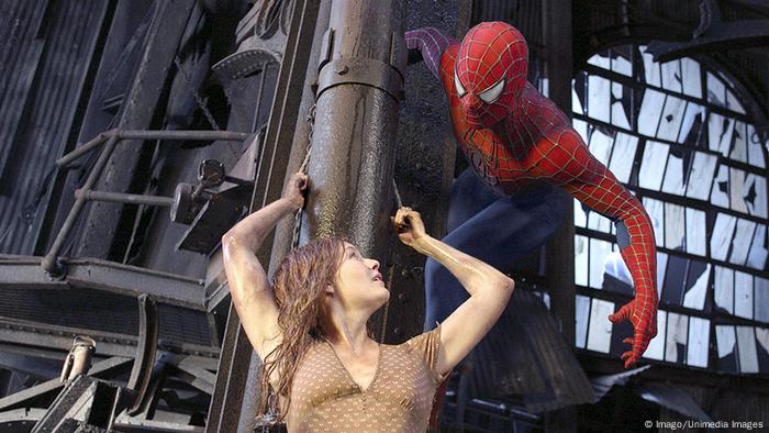 A still from Spider-Man II in which Spider man rescues MJ who is chained to a building.