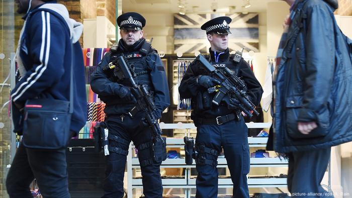 police officers at a train station in the UK