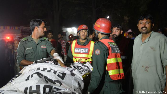 Emergency response teams aid survivors near the blast area