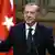 Erdogan speaking at a podium