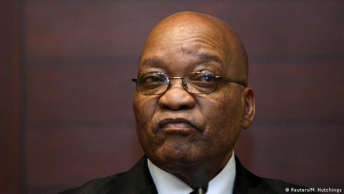 Jacob Zuma against a black background