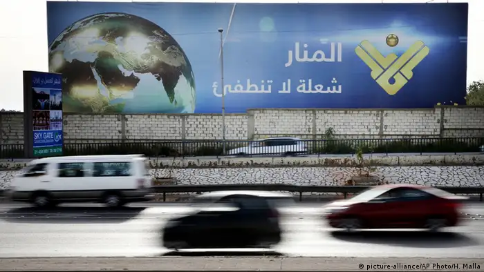 Keeping an eye on the world: Billboard for Al Manar, a Lebanese TV Station © picture-alliance/AP Photo/H. Malla