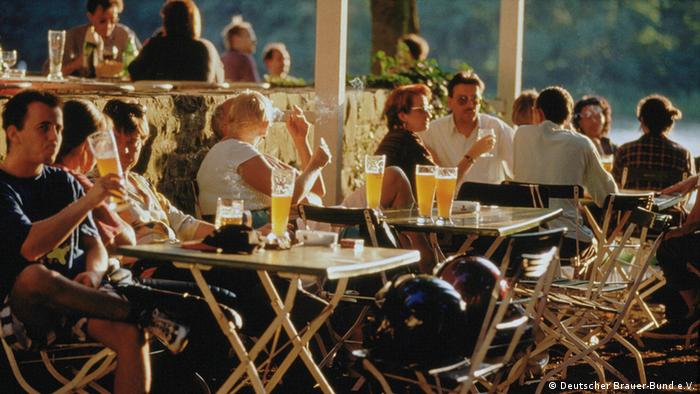 Germany, people sitting in a beer garden