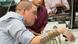 Ian Burkhart, a quadriplegic from the US, moves his paralyzed hand again with the help of an electrode device Ian Burkhart, a quadriplegic from the US, moves his paralyzed hand again with the help of an electrode device