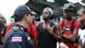 Refugees argue with border police in Central America. Refugees argue with border police in Central America.