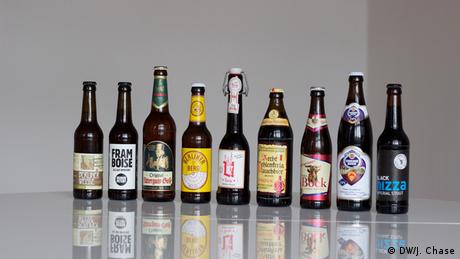 Nine beer bottles at LagerLager in Berlin, Copyright: DW / J.  Chase