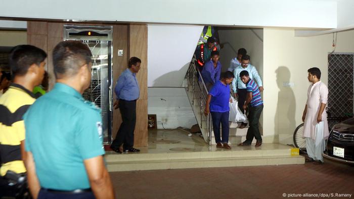 The body of Xulhaz Mannan is removed from his apartment