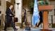 Bashar al-Jaafari walking towards a podium at the UN premises in Geneva Bashar al-Jaafari walking towards a podium at the UN premises in Geneva