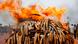 A pile of ivory is set ablaze by Kenya's President Mwai Kibaki at Tsavo West National Park in Kenya, 20 July 2011. Photo: EPA/DAI KUROKAWA A pile of ivory is set ablaze by Kenya's President Mwai Kibaki at Tsavo West National Park in Kenya, 20 July 2011. Photo: EPA/DAI KUROKAWA