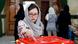 An Iranian woman casting her vote An Iranian woman casting her vote