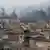 Fumaça paira sobre Aleppo, na Síria, após bombardeios