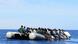 Von der italienischen Küstenwache geretete Flüchtlinge in einem Schlauchboot (Foto: Reuters) Von der italienischen Küstenwache geretete Flüchtlinge in einem Schlauchboot (Foto: Reuters)
