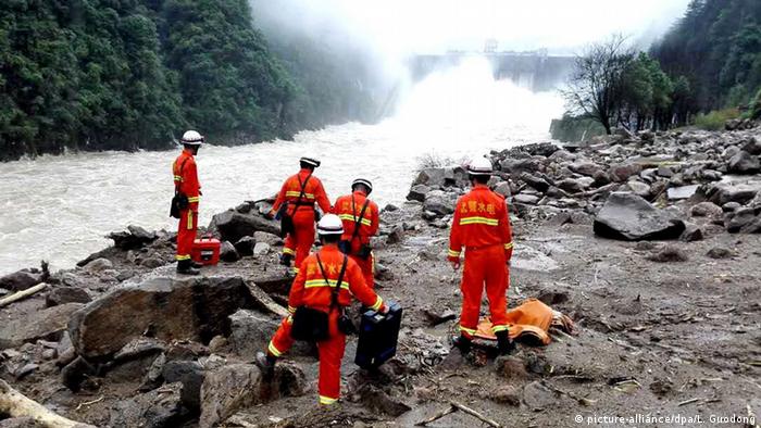 Rescue workers at site of Taining landslide