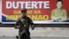 Ein Soldat vor einem Wahlkampfplakat von Rodrigo Duterte (Foto: dpa) Ein Soldat vor einem Wahlkampfplakat von Rodrigo Duterte (Foto: dpa)