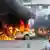 Brennende Autos nach einem Anschlag am 23. Mai in der syrischen Stadt Tartus (Foto: Reuters/SANA)