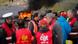Striking French CGT labor union employees stand near a burning barricade to block the entrance of the fuel depot of the SFDM company near the oil refinery of Donges, France, May 25, 2016 in protest over proposed new labour laws Striking French CGT labor union employees stand near a burning barricade to block the entrance of the fuel depot of the SFDM company near the oil refinery of Donges, France, May 25, 2016 in protest over proposed new labour laws