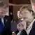 Tusk und Merkel stehen zusammen und reden (Foto: Reuters)