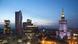 Wieczorny widok na Pałac Kultury i Nauki w Warszawie oraz wieżowce Wieczorny widok na Pałac Kultury i Nauki w Warszawie oraz wieżowce