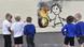Children at Bridge FarmSchool in Bristol view Banksy's mural, Copyright: picture-alliance/dpa/N.Munns Children at Bridge FarmSchool in Bristol view Banksy's mural, Copyright: picture-alliance/dpa/N.Munns