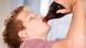 A child drinks a soft drink A child drinks a soft drink
