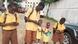 Children walking from school with mobile phones Children walking from school with mobile phones