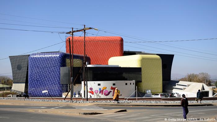 Soweto Theater: three cubes with ceramic tiles in primary colors. 
