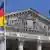 Флаг Германии перед зданием Рейхстага