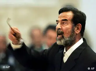 Saddam Hussein argues with the chief judge while testifying during his trial in Baghdad, Iraq