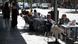 People sit on a café terrace in Madrid People sit on a café terrace in Madrid