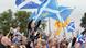 Supporters of Scottish independence wave flags at a rally in Edinburgh Supporters of Scottish independence wave flags at a rally in Edinburgh