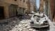 A damaged vehicle is seen on the debris of buildings after a warcraft belonging to the Russian army carried out an attack in Aleppo, Syria A damaged vehicle is seen on the debris of buildings after a warcraft belonging to the Russian army carried out an attack in Aleppo, Syria