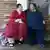 Ein übergewichtiges Paar sitzt auf einer Bank, Quelle: dpa