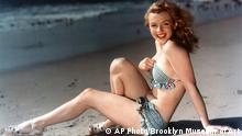 Bildergalerie zu 70 Jahren Bikini: This photograph released by the Brooklyn Museum of Art, titled Marilyn on the Beach, 1949, is part of a show opening at the museum Friday, Nov. 12, 2004. The picture by an unknown photographer is one of more than 200 Marilyn Monroe pictures from 39 photographers - including luminaries such as Richard Avedon, Gordon Parks, Robert Frank and Andy Warhol - in the museum's new exhibit, I Want to Be Loved by You: Photographs of Marilyn Monroe. (AP Photo/Brooklyn Museum of Art) Copyright: AP Photo/Brooklyn Museum of Art