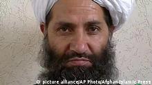 In this undated and unknown location photo, the new leader of Taliban fighters, Mullah Haibatullah Akhundzada poses for a portrait. Afghanistan's government has offered the new Taliban leader a choice: make peace or face the same fate as his predecessor, who was killed last week in a U.S. drone strike. (Afghan Islamic Press via AP) | picture alliance/AP Photo/Afghan Islamic Press