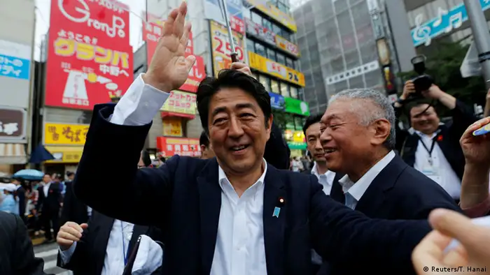 Japan Shinzo Abeshakes LDP (Reuters/T. Hanai)