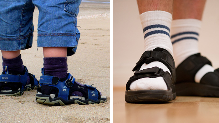 Мальчик и мужчина в сандалиях и носках