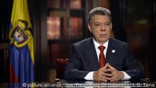 19.07.2016 *** epa05431430 A handout picture made available by the Presidency of Colombia on 19 July 2016 shows the President of Colombia Juan Manuel Santos speaking to the nation during a televised speech in Bogota, Colombia, 18 July 2016. During the speech Santos stated that the holding of the referendum to endorse the peace agreements to be signed with the Revolutionary Armed Forces of Colombia (FARC), backed by the Constitutional Court today, is perhaps the most important vote in the country's history. EPA/JUAN DAVID TENA / PRESIDENCY OF COLOMBIA / HANDOUT HANDOUT EDITORIAL USE ONLY/NO SALES Copyright: picture-alliance/dpa/Presidency Of Colombia/J. D. Tena
