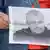 Акция в Киеве памяти Павла Шеремета - его портрет держит в руках человек