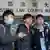 Nathan Law (i), Joshua Wong (c) y Alex Chow (d) ante la corte en julio.