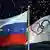 Российский и олимпийский флаги
