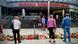 People mourning outside of the Olympia shopping center in Munich, Germany People mourning outside of the Olympia shopping center in Munich, Germany