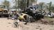 Iraqis inspect the damage at the site of a suicide bomb attack Iraqis inspect the damage at the site of a suicide bomb attack