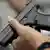 Man holding a Glock 42 postol