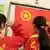 China Schülerinnen Kommunismus