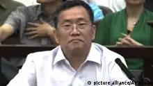 04.08.2016 In this image from video, Zhou Shifeng sits for his trial at the Tianjin No. 2 Intermediate People's Court in northern China's Tianjin Municipality Thursday, Aug. 4, 2016. Zhou, a Chinese lawyer was in court Thursday in the third of a series of subversion trials demonstrating the ruling Communist Party's determination to shut down independent human rights activists and government critics. (CCTV via AP Video) Copyright: picture alliance/AP Photo