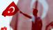 A man waves Turkey's national flag during the Democracy and Martyrs Rally A man waves Turkey's national flag during the Democracy and Martyrs Rally