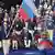 Российская паралимпийская сборная несет флаг на играх в Сочи