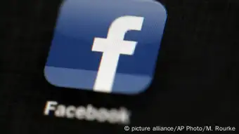 Facebook icon on a smartphone screen