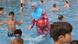 Deutschland Frau trägt Burkini in einem Freibad in Berlin Deutschland Frau trägt Burkini in einem Freibad in Berlin