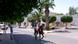 A boy rides a horse down a street in Zarzis, Tunesia A boy rides a horse down a street in Zarzis, Tunesia